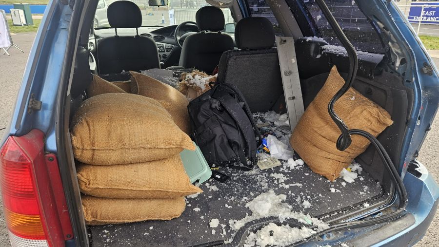 BlastSax in car after suspected package has been blown up using a controlled explosion.jpg